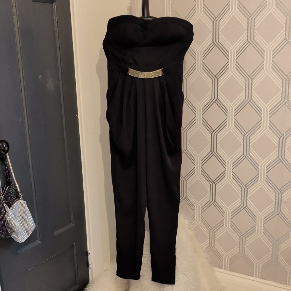 bebe Black Strapless Jumpsuit with Gold Accent
